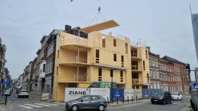 Cr�dit photo La Maison De Demain : Pose d�un panneau de plancher du 4�me �tage